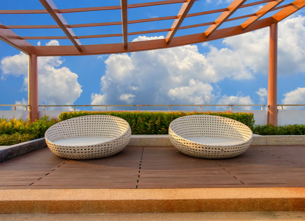 Relax corner on condominium rooftop garden with chairs