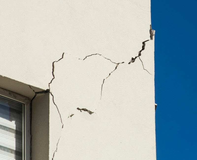 Cracked walls on the building